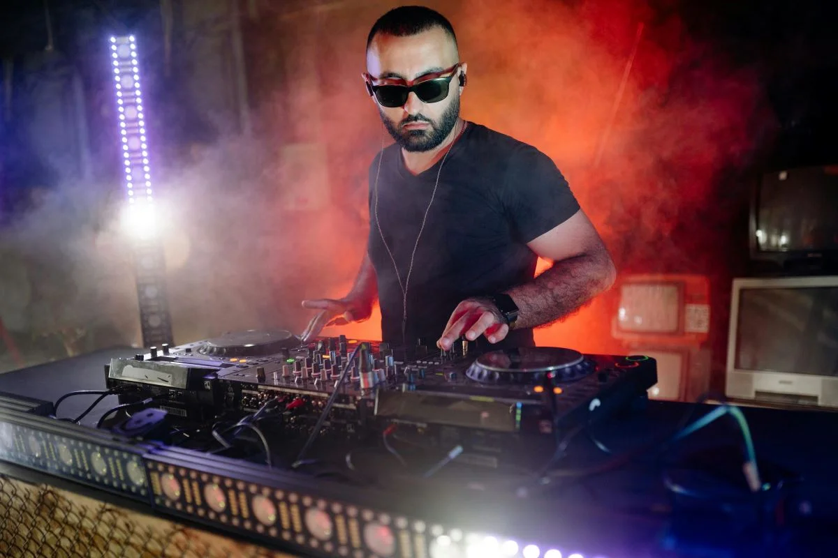 DJ playing music -how much does a wedding dj cost
